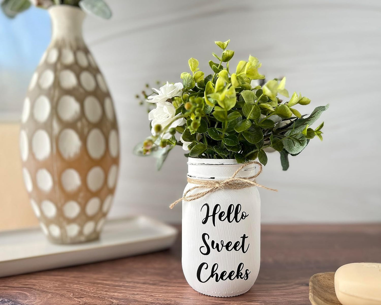 Hello Sweet Cheeks Bathroom Decor for Bathroom | Pint 16 oz, 7" Height | Hand Painted and Distressed Mason Jar Decor with Artificial Flowers | Rustic Farmhouse Funny Bathroom Decor for Shelf